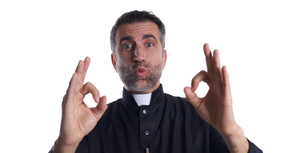 priest with ok finger hands sign scaled e1637051041891